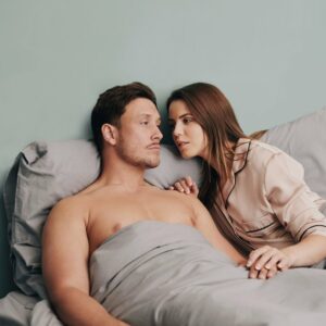 couple in bed with Flatulance bedding